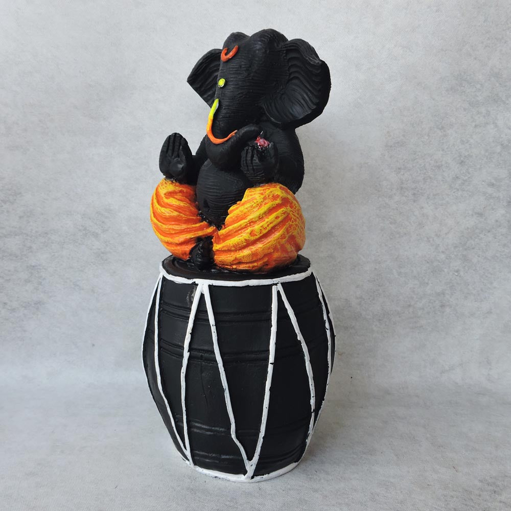 Ganesha On Dholak / Orange & Black Finish by Satgurus