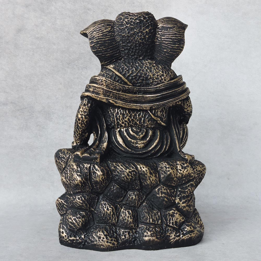 Ganesha Sitting On Stone / Metallic by Satgurus