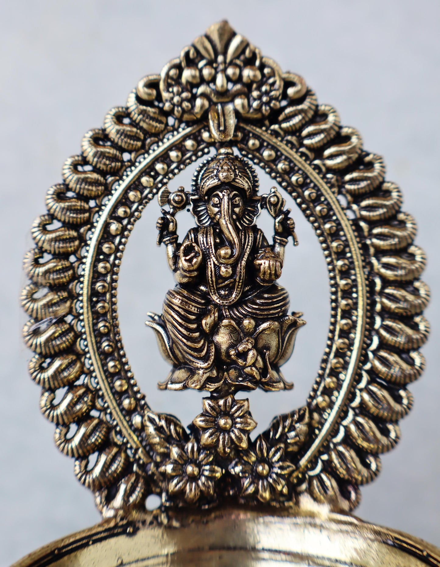 Ashtadhatu Diya With Ganesh Motif by Satgurus