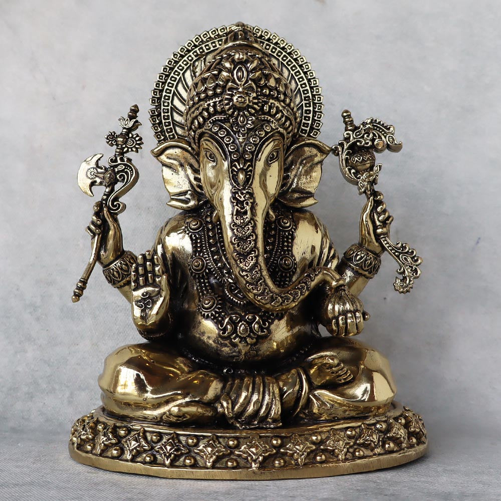 Lord Ganesha Holding Modak by Satgurus