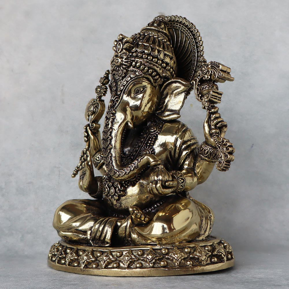 Ashtadhatu Lord Ganesha Holding Modak by Satgurus