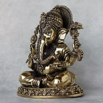 Lord Ganesha Holding Modak by Satgurus