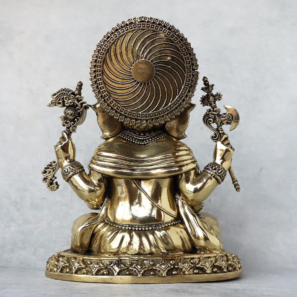 Ashtadhatu Lord Ganesha Holding Modak by Satgurus