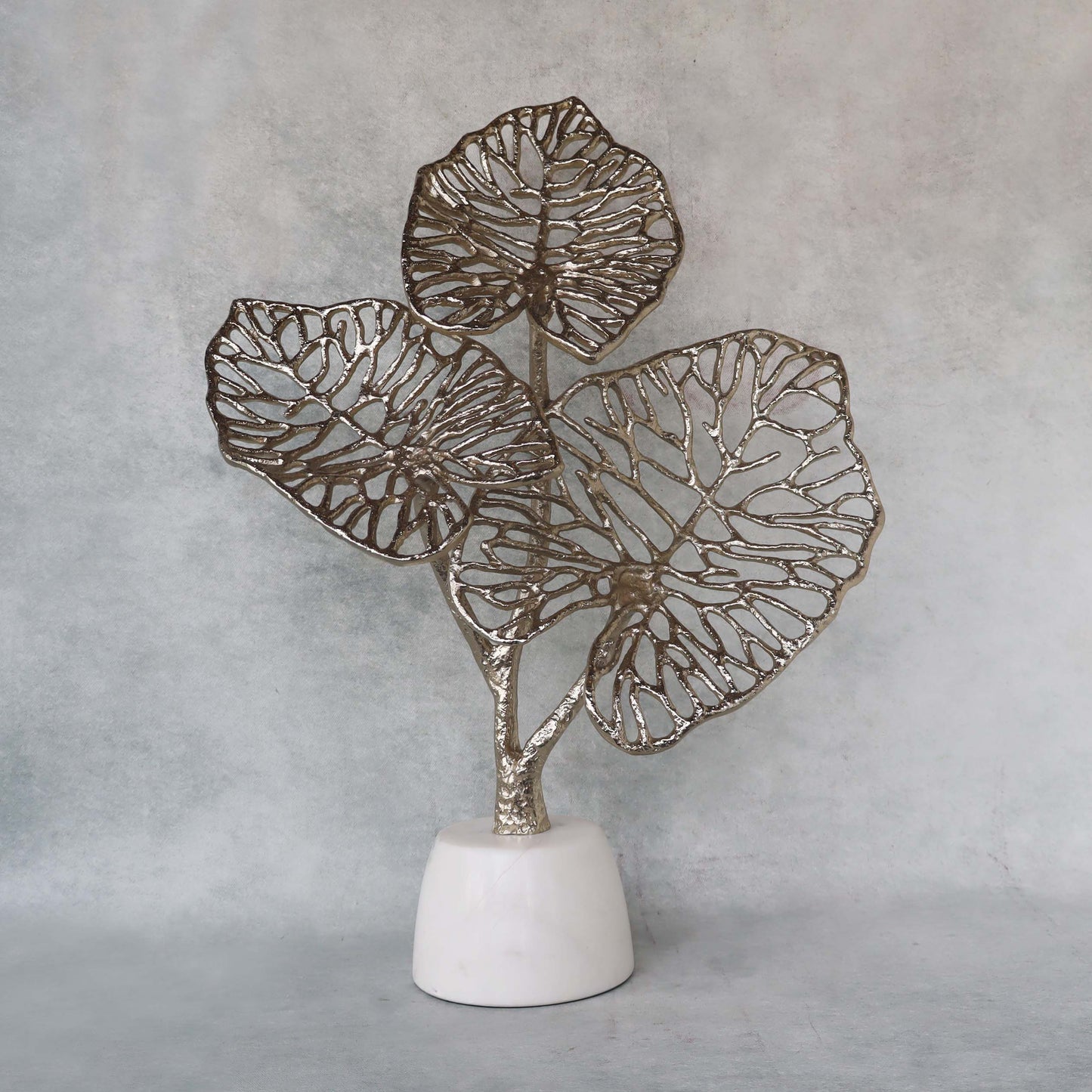 Leaves On Marble Base by Satgurus