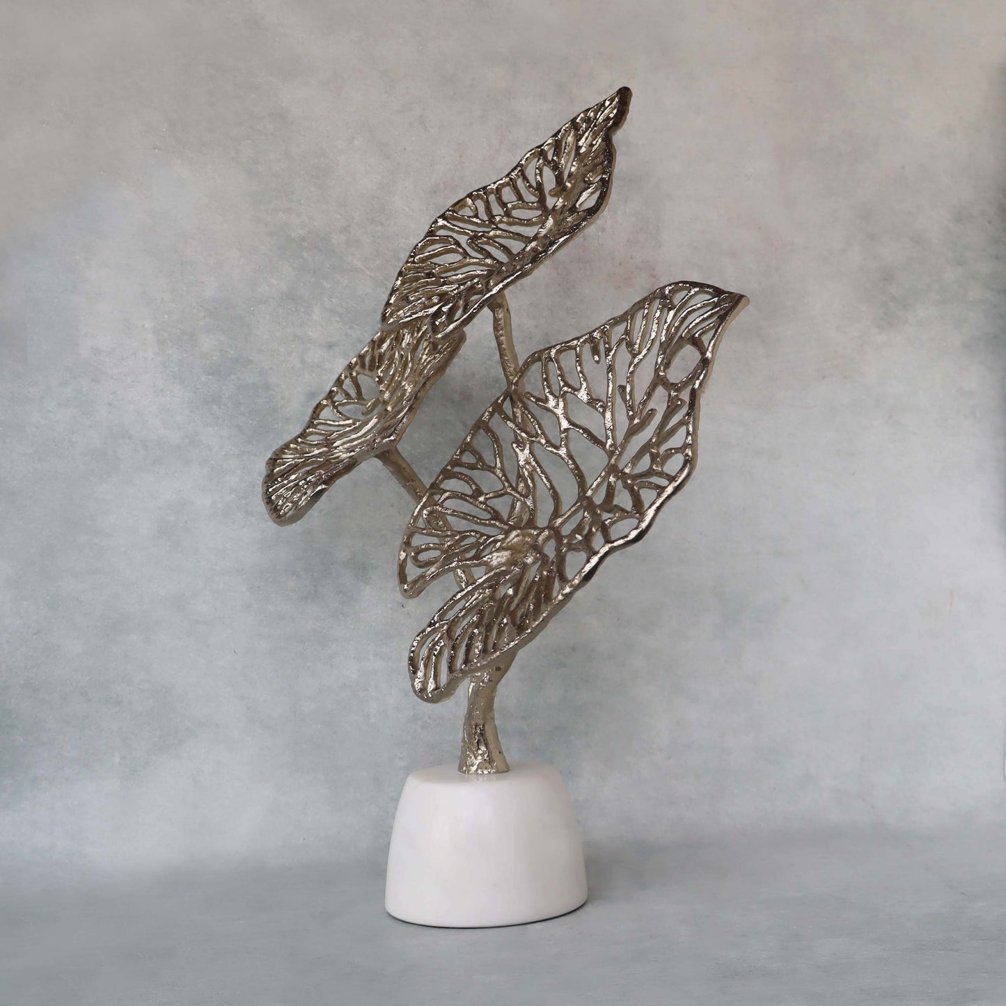 Leaves On Marble Base by Satgurus