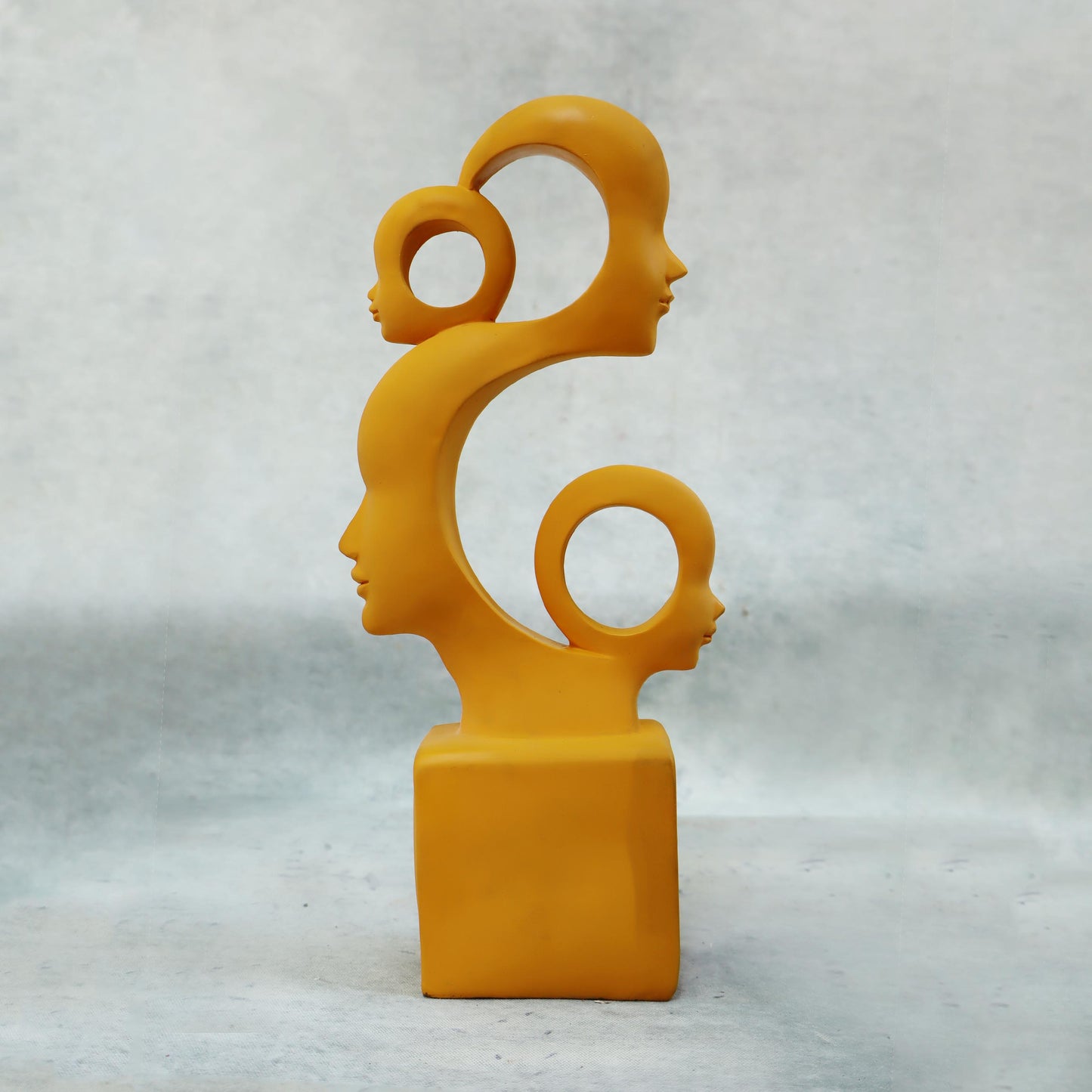 Family Cutwork Faces Sculpture / Yellow by Satgurus