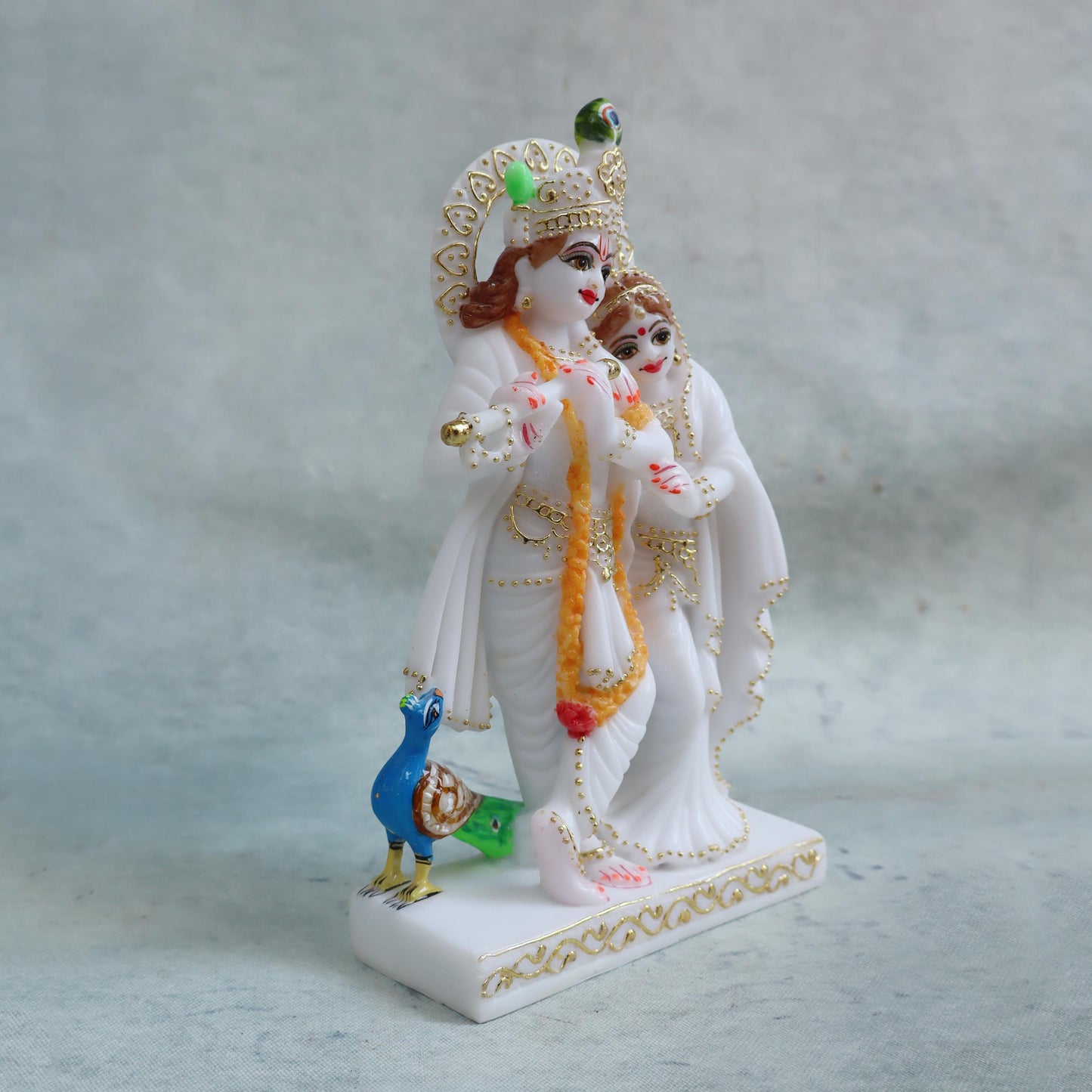 Radha Krishna Idol / Orange Garland by Satgurus