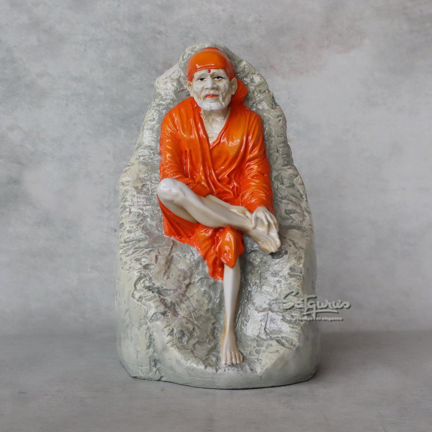 Sai Baba Sitting On Stone by Satgurus