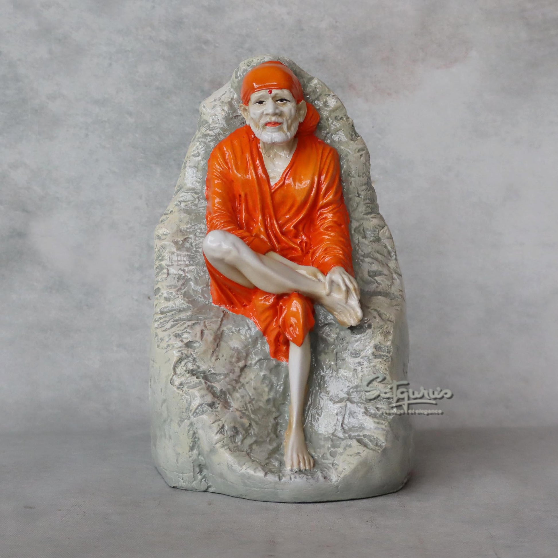 Sai Baba Sitting On Stone by Satgurus