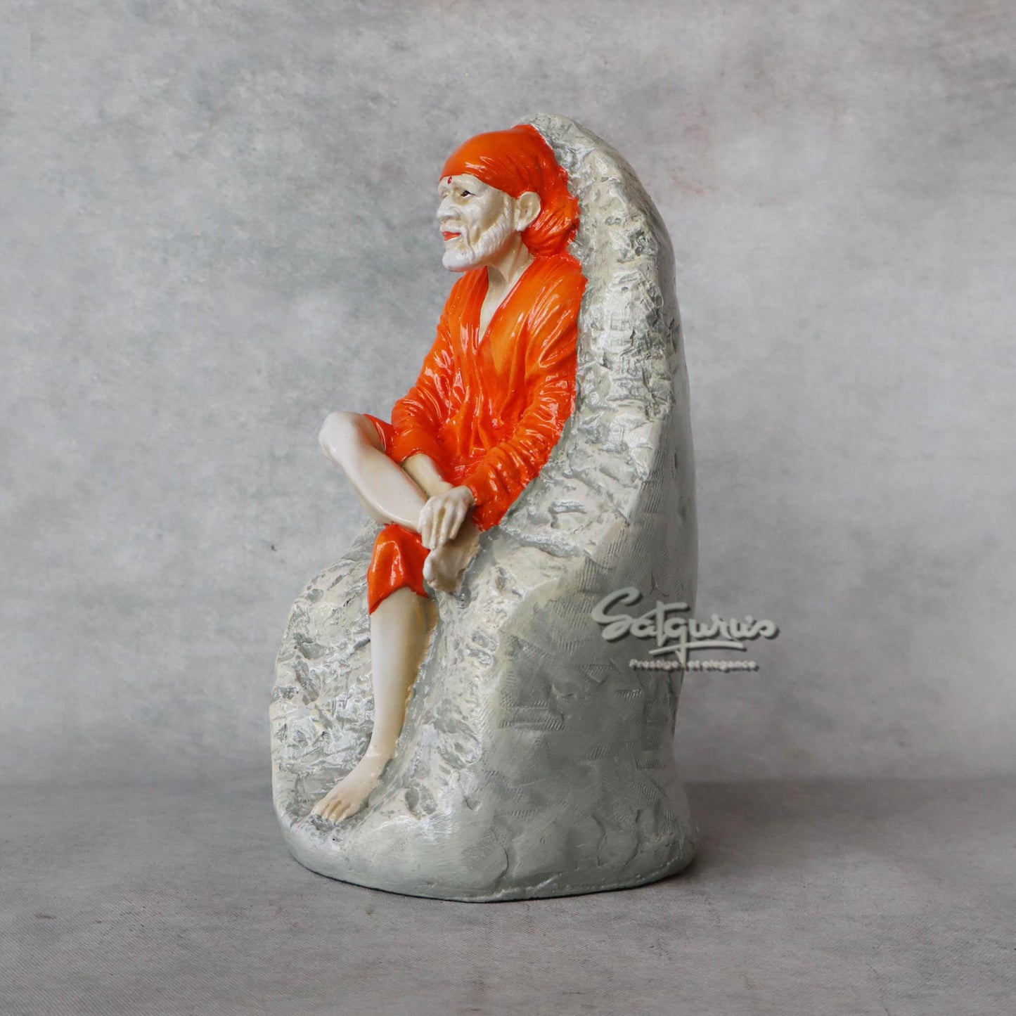 Sai Baba Sitting On Stone by Satgurus