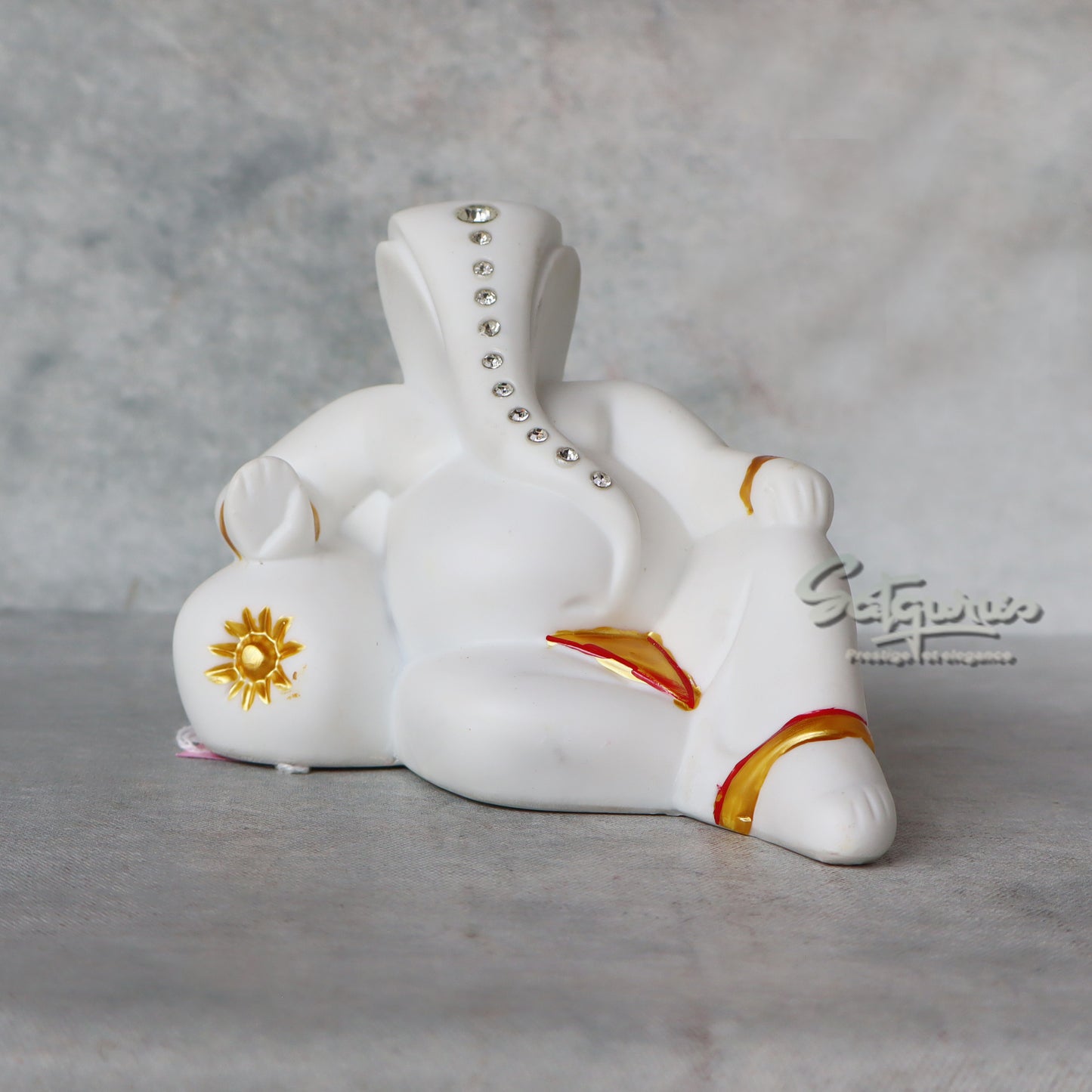 Resting White Ganesha by Satgurus