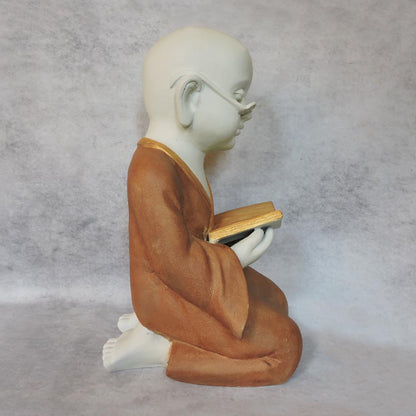 Monk Reading Book by Satgurus