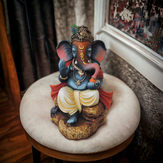 Blessing Ganesha Sitting On Stone by Satgurus