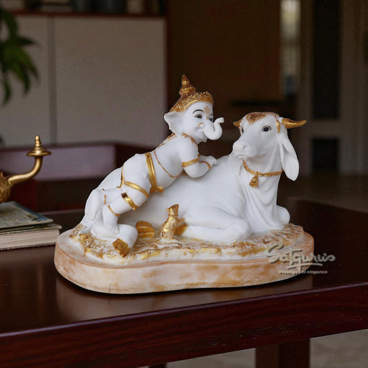 Baby Ganesha & Cow by Satgurus