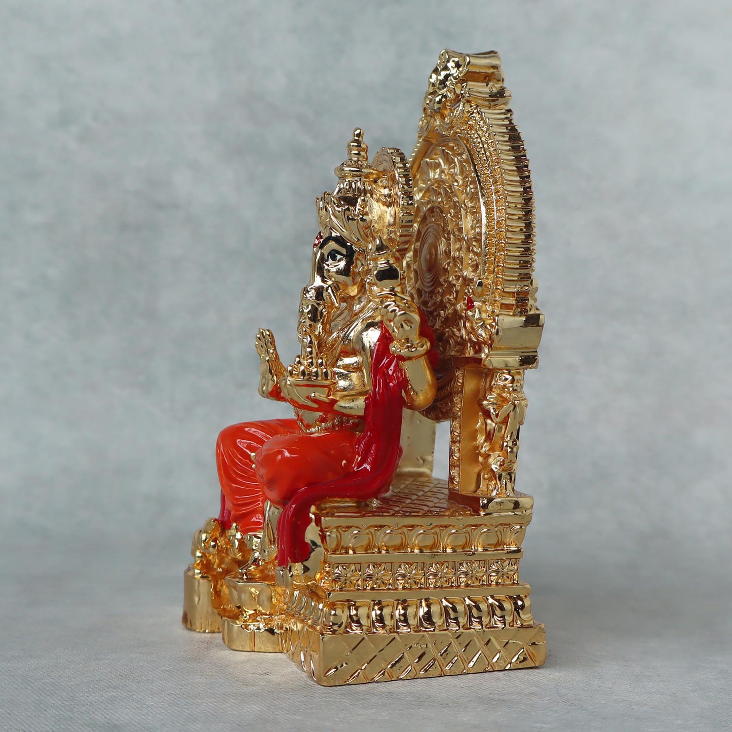 Gold Plated Ganesha Sitting by Satgurus