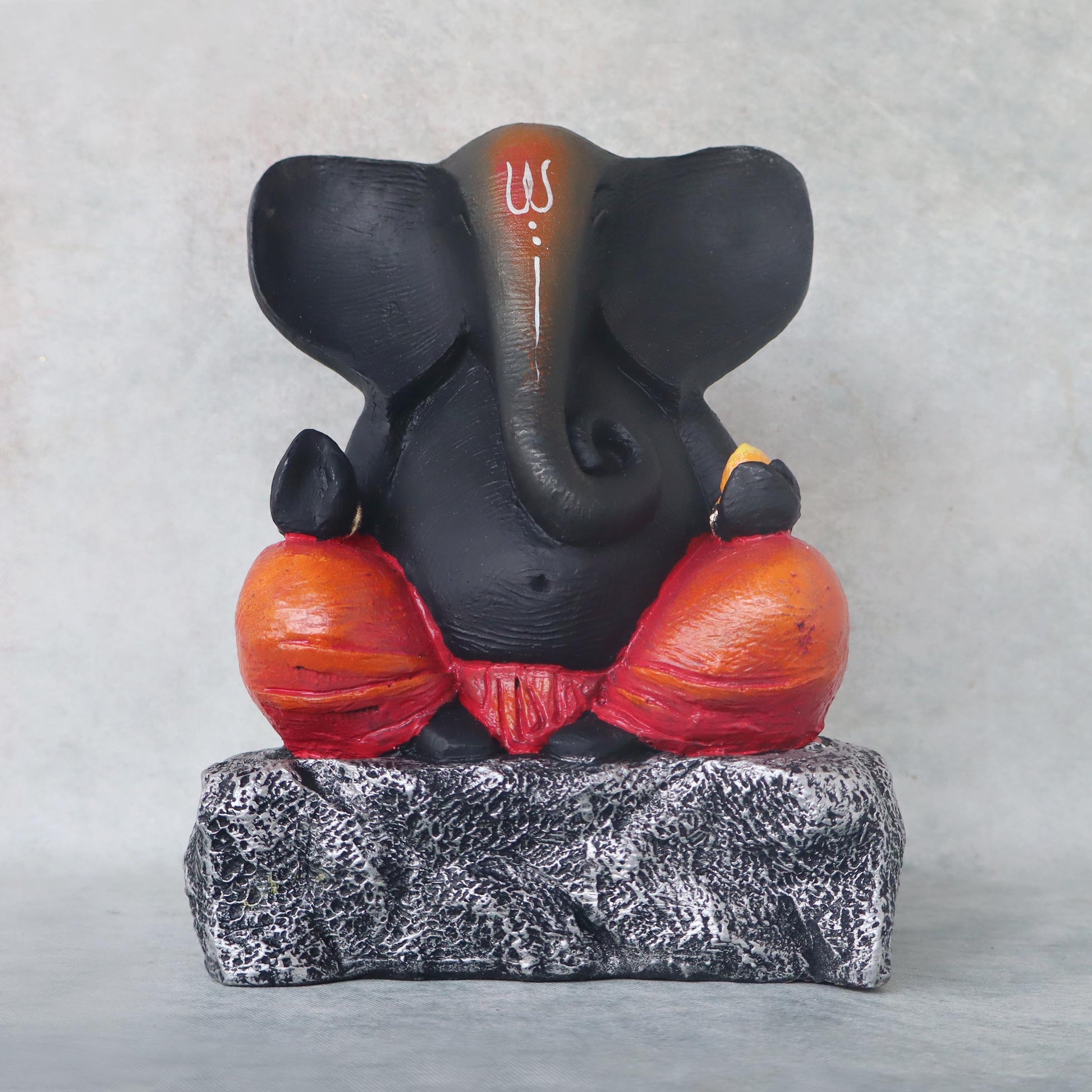 Ganesha Sitting On Stone / Red by Satgurus