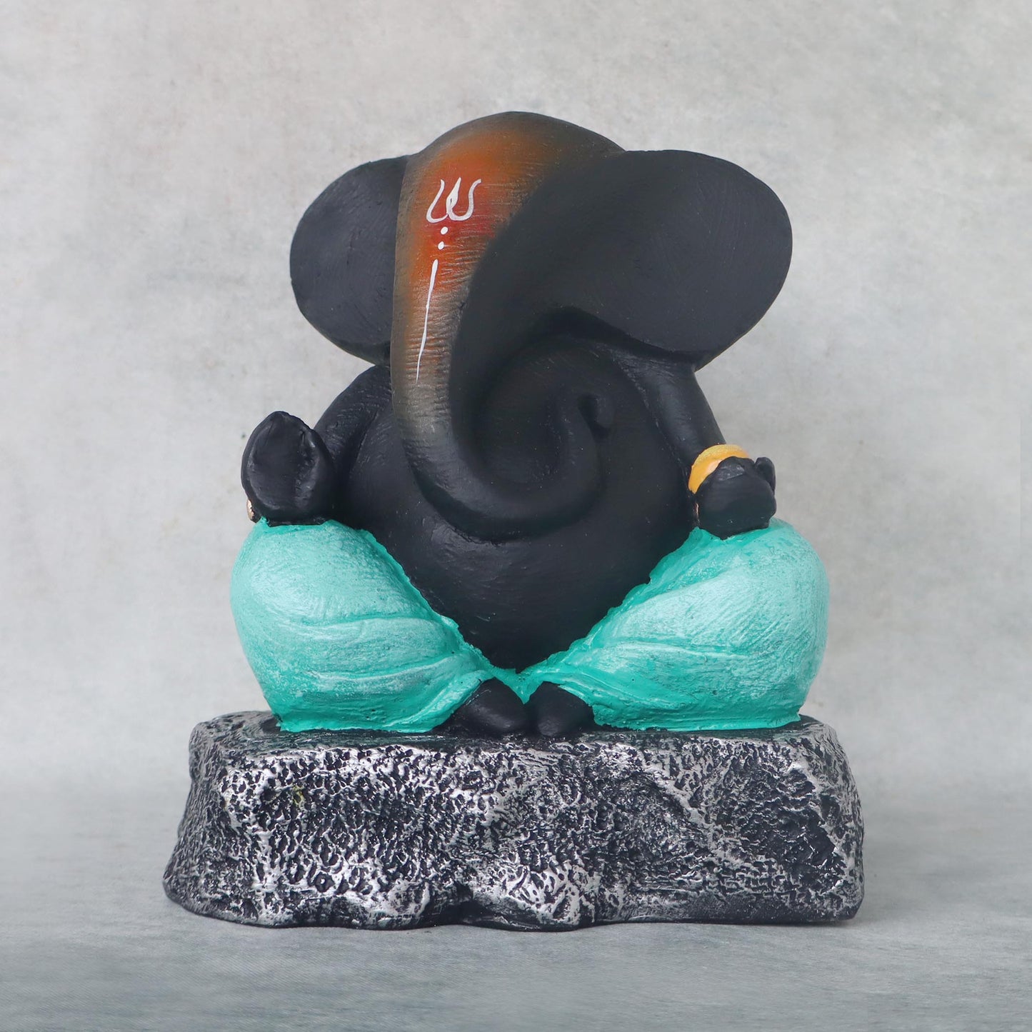 Ganesha Sitting On Stone / Green by Satgurus