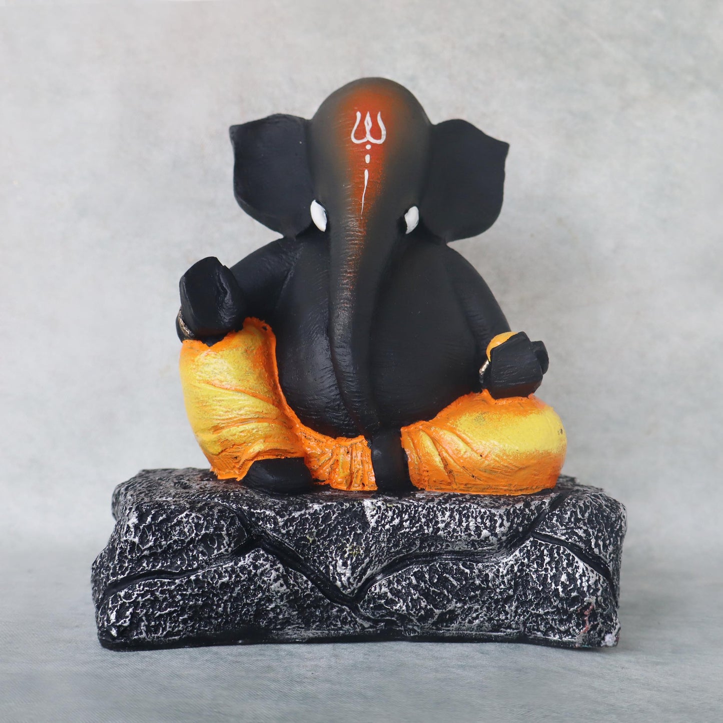 Ganesha Sitting On Stone / Orange by Satgurus