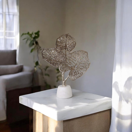 Leaves On Marble Base by Satgurus