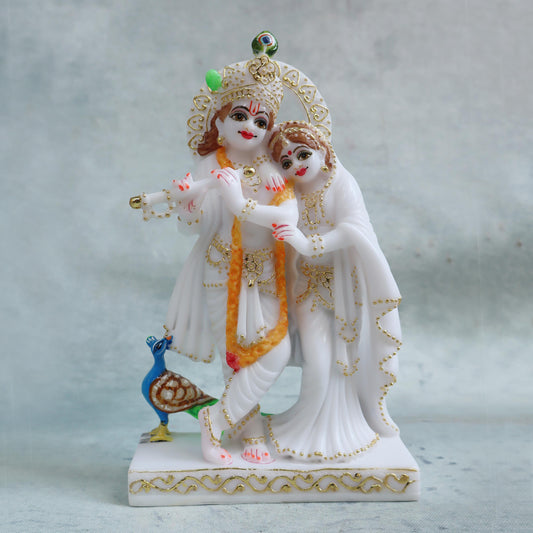 Radha Krishna Idol / Orange Garland by Satgurus