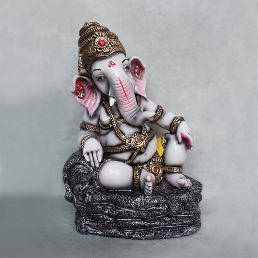 Resting Ganesha On Stone by Satgurus