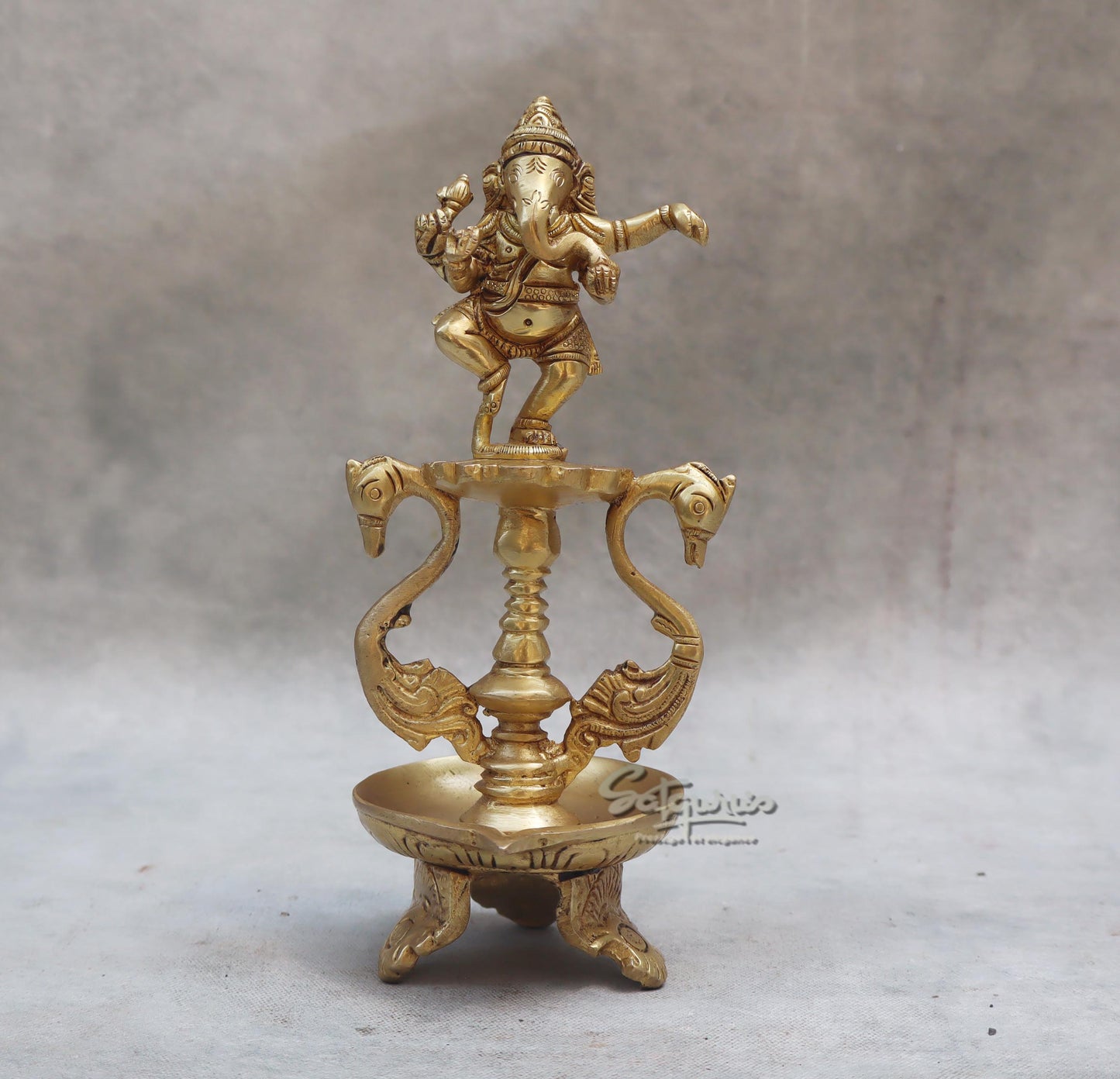Dancing Ganesha On Diya by Satgurus