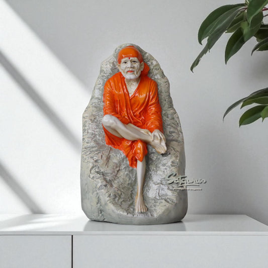 Sai Baba Sitting On Stone by Satgurus