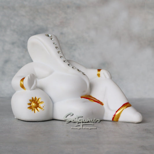 Resting White Ganesha by Satgurus