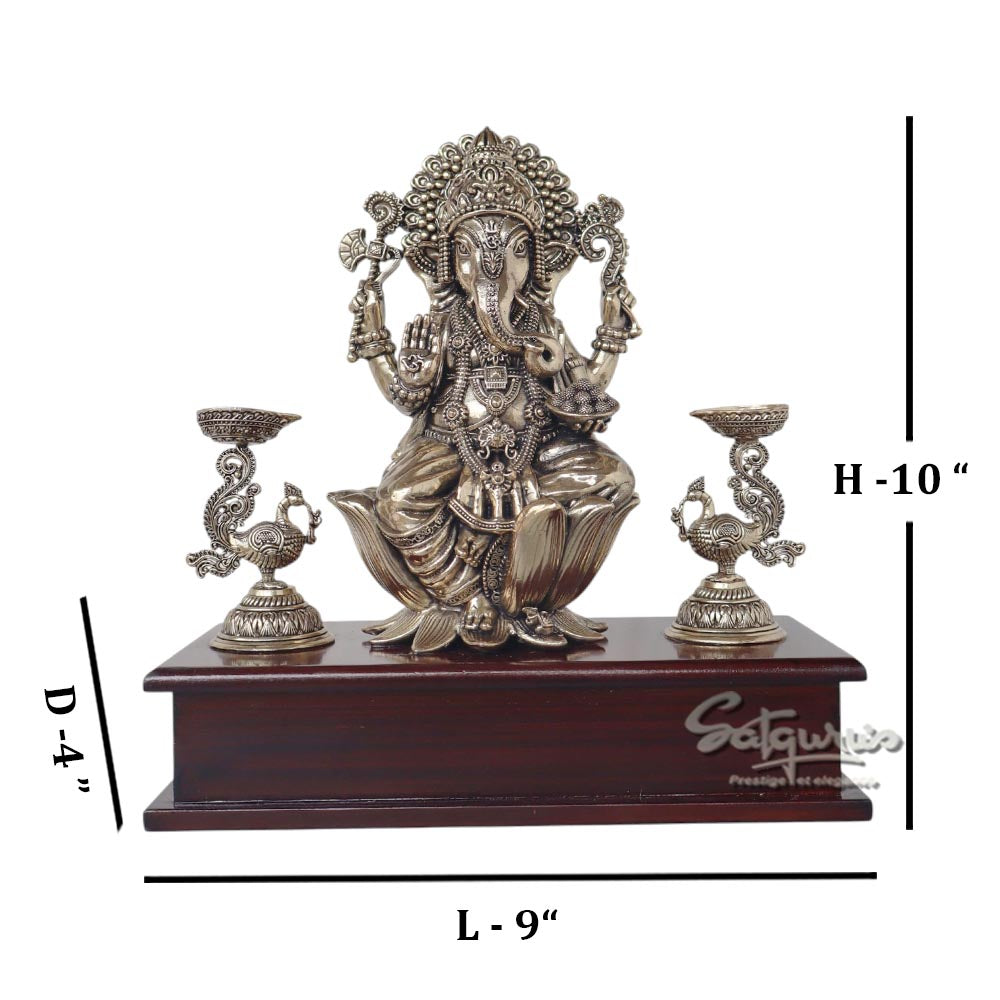 Ganesha With Lamps On Base by Satgurus