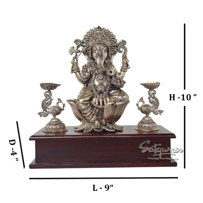 Ganesha With Lamps On Base by Satgurus