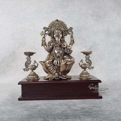 Ganesha With Lamps On Base by Satgurus