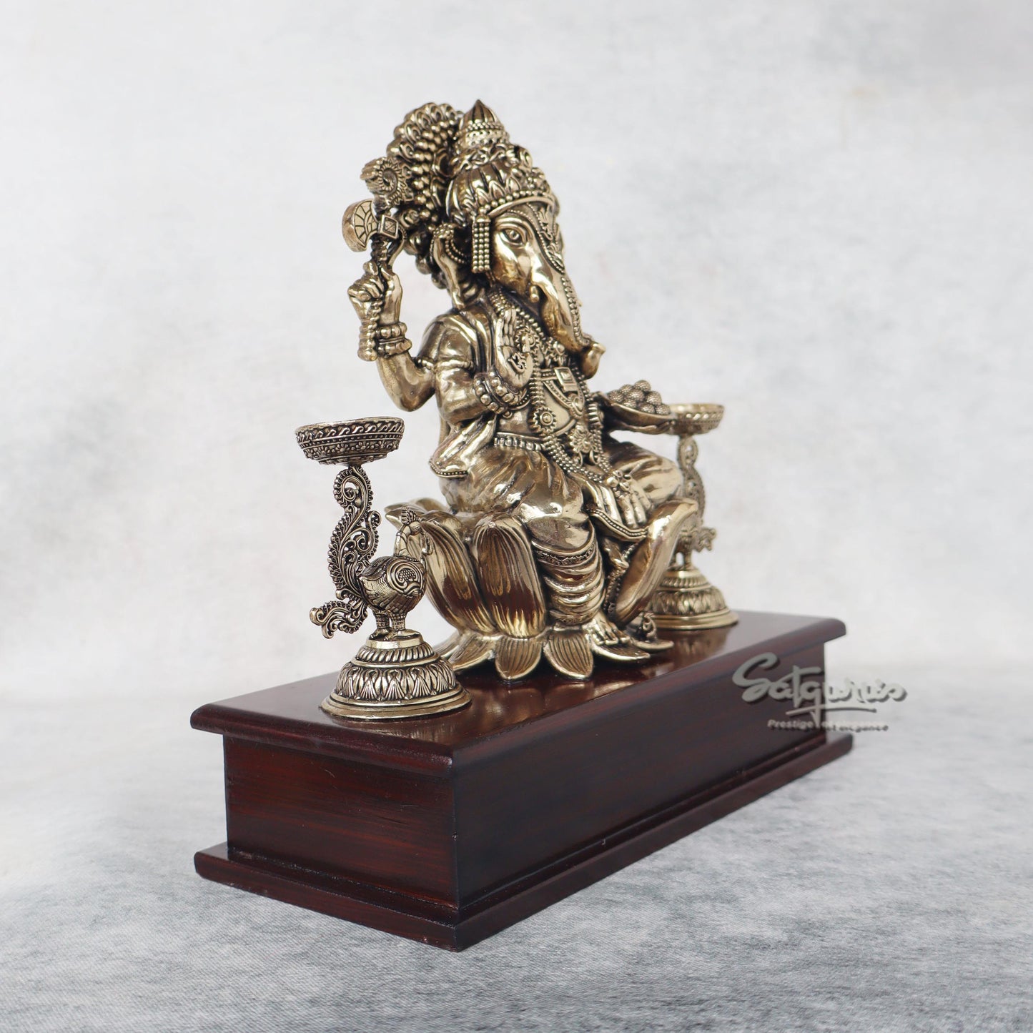 Ganesha With Lamps On Base by Satgurus