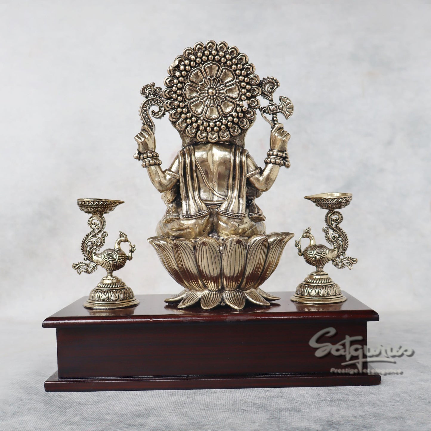 Ganesha With Lamps On Base by Satgurus