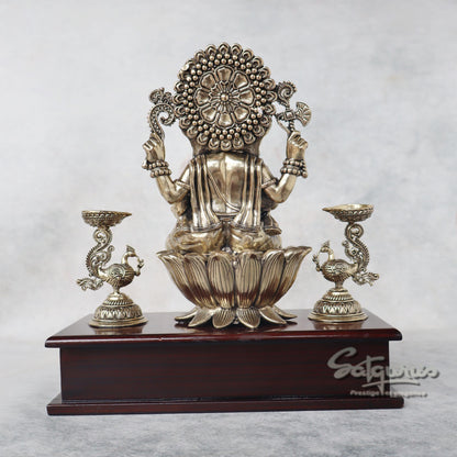 Ganesha With Lamps On Base by Satgurus