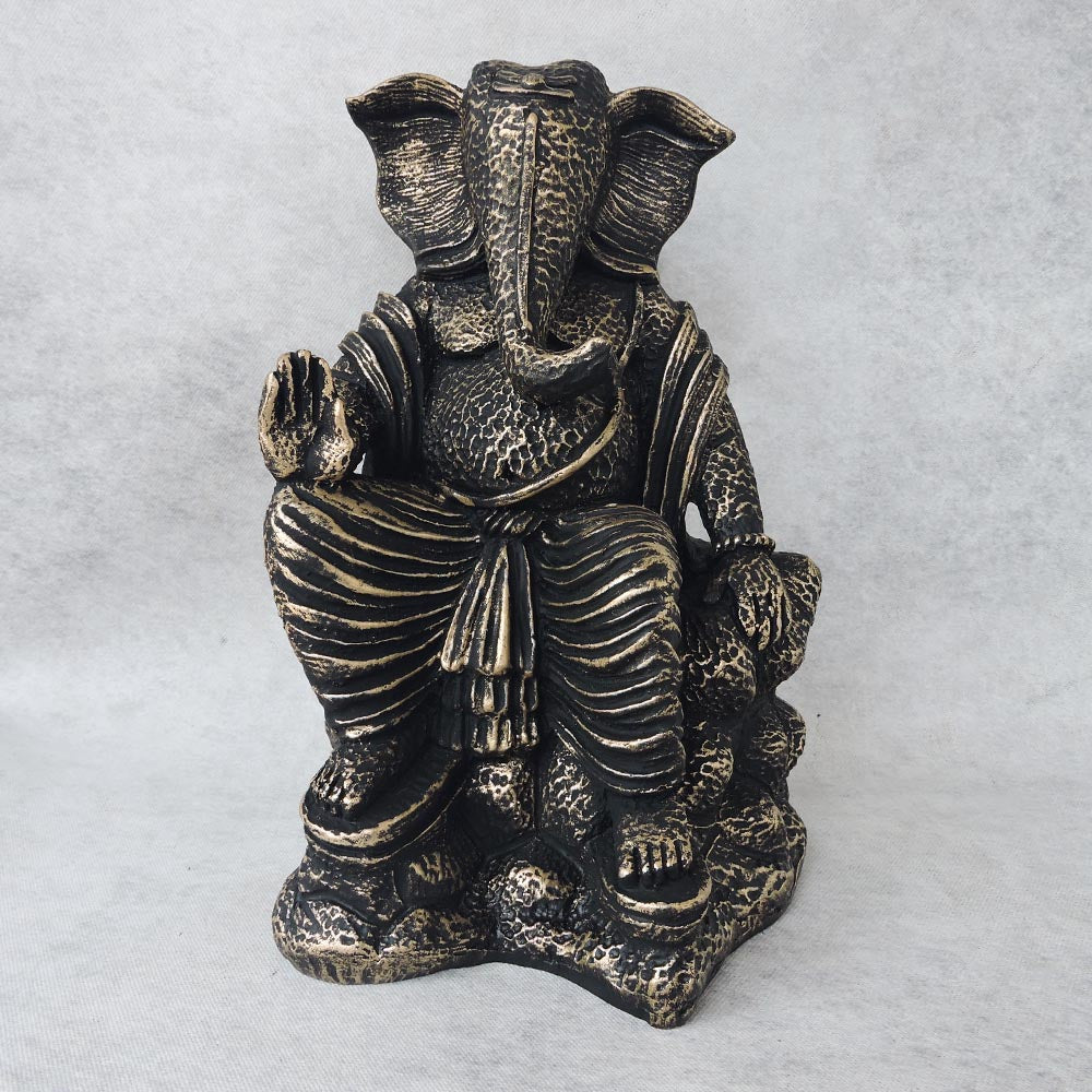 Ganesha Sitting On Stone / Metallic by Satgurus